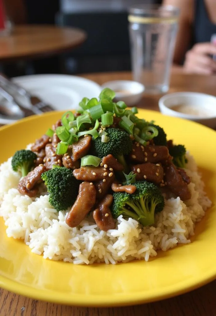 Finished Quick Weeknight Beef and Broccoli Stir-Fry served with rice, perfect for a quick weeknight meal.