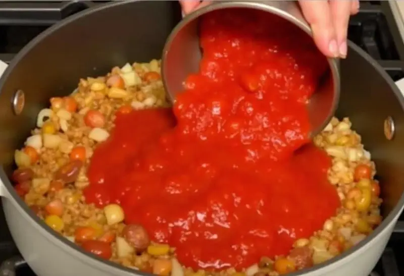 Incorporating San Marzano crushed tomatoes into the sauce for a rich and robust flavor profile.